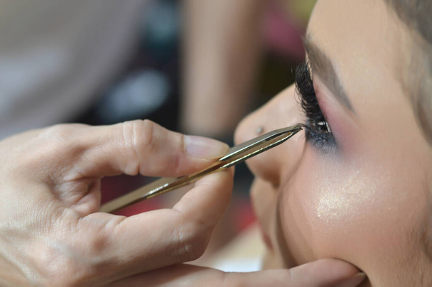 Asiatische Mädchen in Make-up, Fokus in den Augen ausgewählt - Foto, Bild