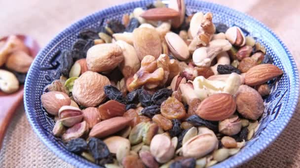 close up of mixed nut in a plate on table, - Footage, Video