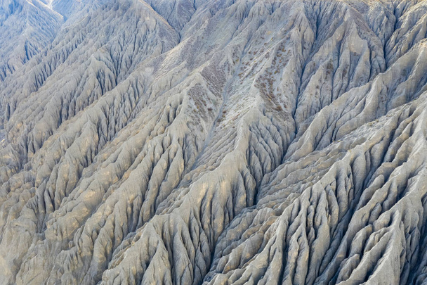 gully texture on kuitun river grand canyon, rain water erosion corrosion background - Foto, immagini