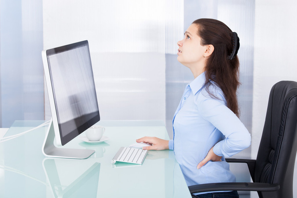 Businesswoman Suffering From Back Pain - Photo, image