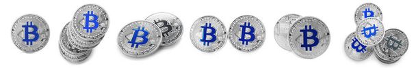 Muchos bitcoins de plata sobre fondo blanco
 - Foto, imagen