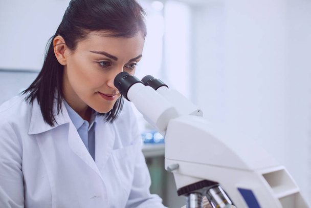 Alert female biologist working in the modern lab - Photo, Image
