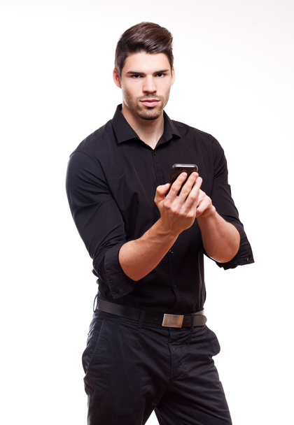 Young businessman using smartphone. - Foto, Imagen