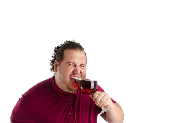 Funny fat man and red wine. - Valokuva, kuva
