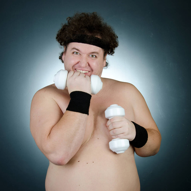 Sports nutrition, diet and healthy lifestyle. Funny fat guy. - Photo, Image