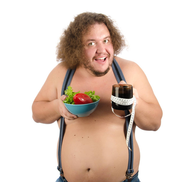 Uomo grasso divertente su una dieta
. - Foto, immagini