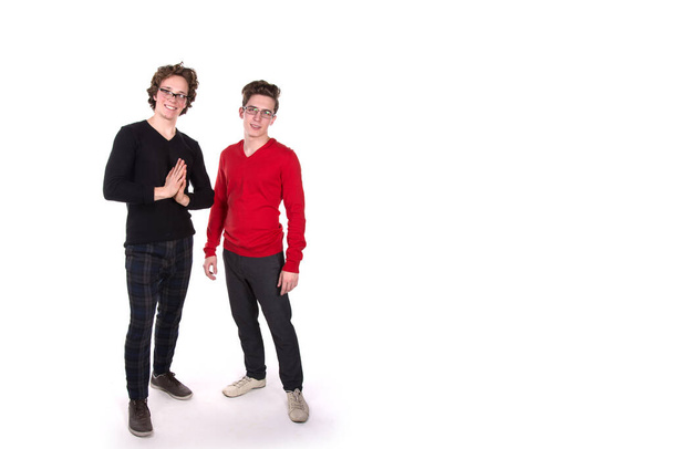 Two funny students. White background. - Foto, imagen