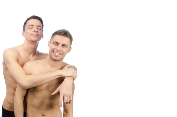 Couple. Two attractive guys. White background. - Foto, afbeelding