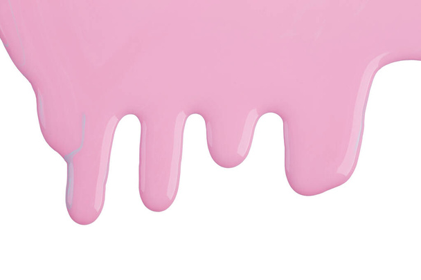Pink dripping paint against a white background - Fotografie, Obrázek