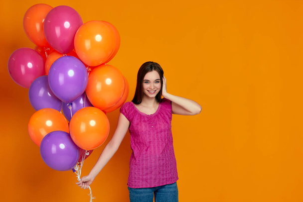 girl posing with bright color air balloons - Фото, зображення