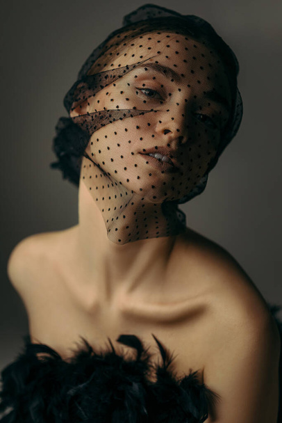 beauty elegant girl posing in black veil - 写真・画像