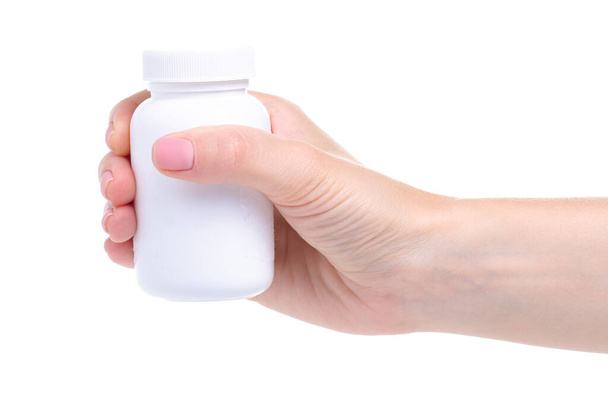 White jar of pills medicine pharmacy in hand - Фото, изображение