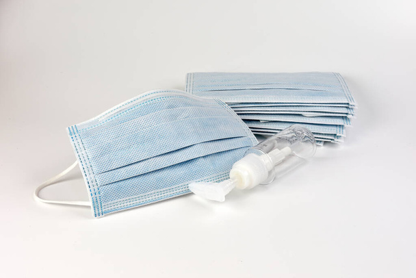 Surgical mask heavy duty blue color medical mufti layer filter for virus dust pollution plastic disposable bottle - Photo, Image