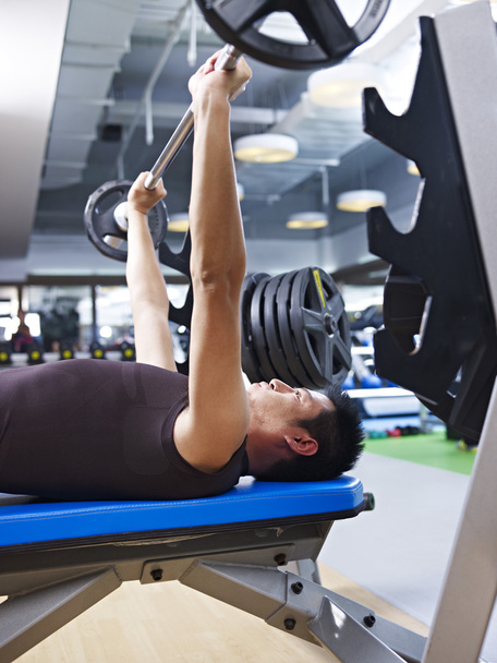 Weightlifting in gym - Фото, зображення