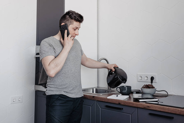 man works remotely at home and seizes stress - Photo, Image
