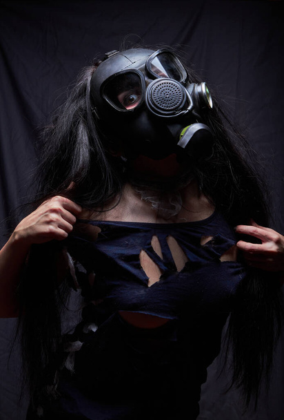 Girl in a gas mask, pandemic virus covid2019 - Photo, Image