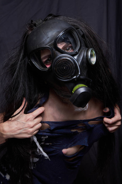 Girl in a gas mask, pandemic virus covid2019 - Photo, Image