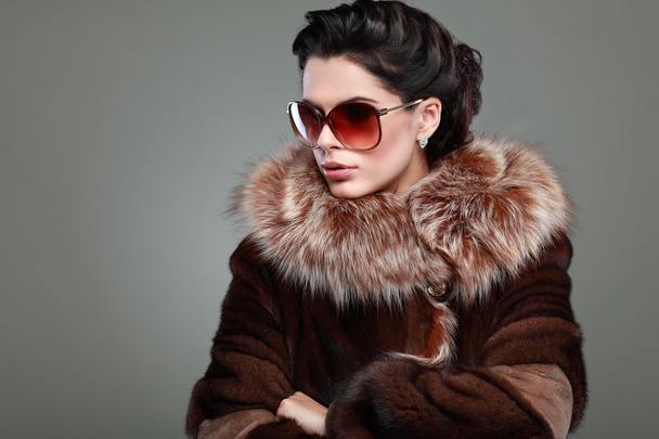 A photo of sexual beautiful girl is in fur clothes - 写真・画像