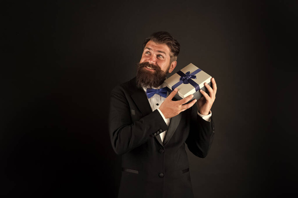 Solution for boxing day. Happy businessman hold present box. Bearded man enjoy boxing day sale. Boxing day shopping. Gift shop. Black Friday. New year and Christmas. Boxing day offer - Photo, image
