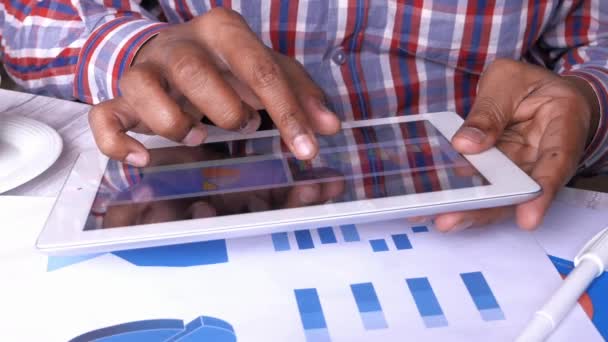 businessman analyzing financial data on digital tablet  - Footage, Video
