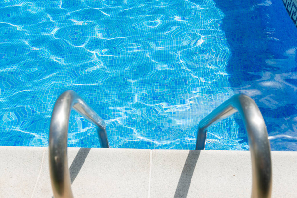 Swimming blue pool with stair  - Φωτογραφία, εικόνα