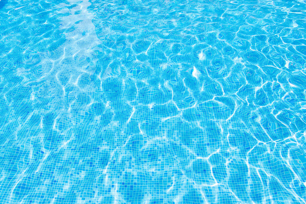 surface of blue swimming pool,background of water in swimming pool. - Фото, зображення