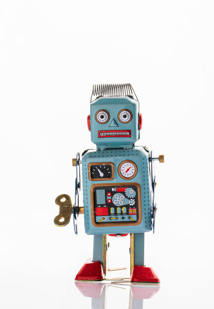 Вінтажний робот олов'яна іграшка на фоні yello
 - Фото, зображення
