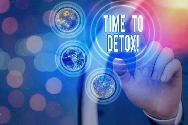 Text sign showing Time To Detox. Conceptual photo when you purify your body of toxins or stop consuming drug Elements of this image furnished by NASA. - Photo, Image