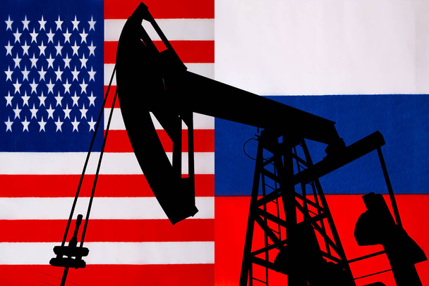 Business dialogue, oil agreement concept : National flags of USA and Russia. A symbol of cooperation between Moscow Kremlin and White House. War over oil prices. - Foto, immagini