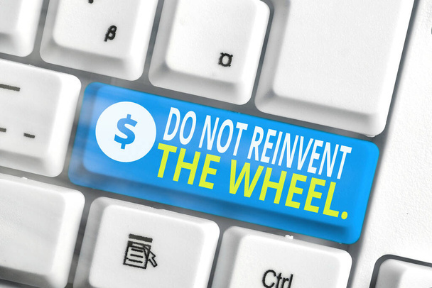 Text sign showing Do Not Reinvent The Wheel. Conceptual photo stop duplicating a basic method previously done. - Photo, Image