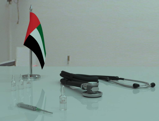 Seringue, vaccin contre le coronovirus COVID 19 et phonendoscope sur une table médicale aux Émirats arabes unis
. - Photo, image