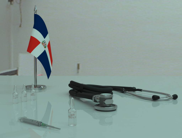 Injekční stříkačka, vakcína proti koronoviru COVID 19 a fonendoskop na lékařském stole v Dominikánské republice. - Fotografie, Obrázek