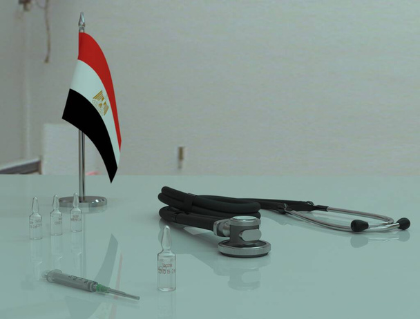 Шприц, короновирусная вакцина COVID 19 и фонендоскоп на медицинском столе в Египте
. - Фото, изображение