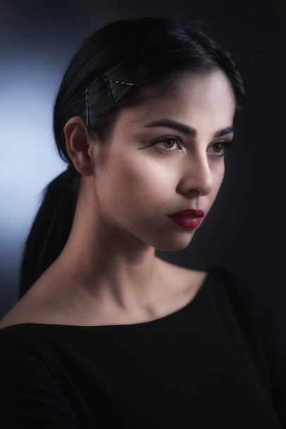 Beautiful young Armenian girl, portrait of a young Caucasian girl with dramatic, Hollywood light - Fotoğraf, Görsel