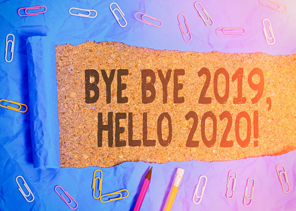 Handschrift sms schrijven Bye Bye 2020 Hello 2020. Concept betekent afscheid nemen van vorig jaar en weer een goede verwelkomen. - Foto, afbeelding