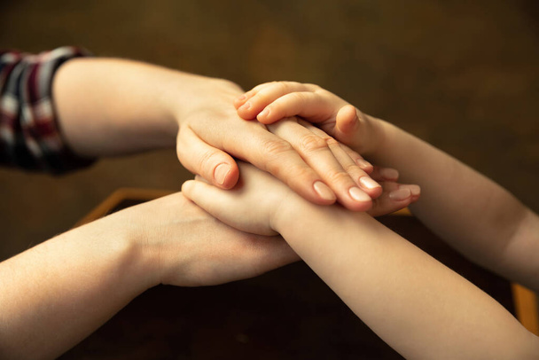 Close up of female and kids hands doing things together, family, home concept - Photo, Image