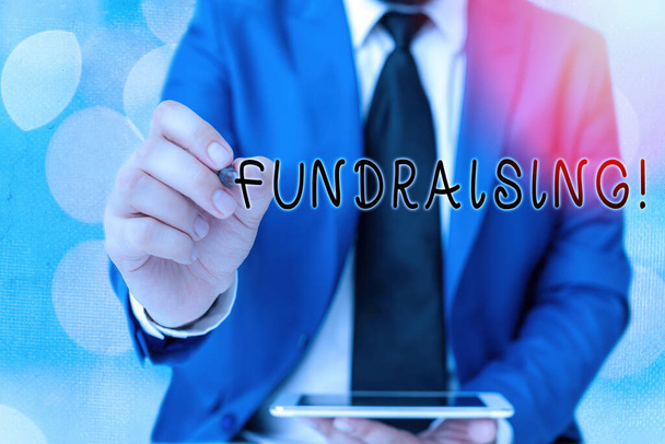 Word writing text Fundraising. Business concept for seeking to generate financial support for charity or cause. - Photo, Image