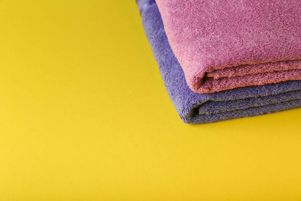 background with purple towels close up - Foto, afbeelding
