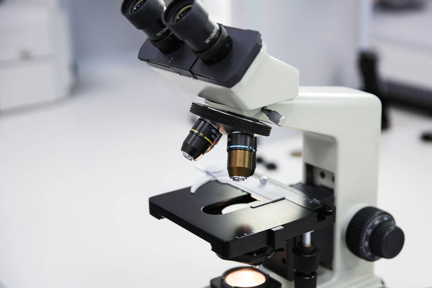 modern professional microscope in the laboratory on the table - Foto, Imagen