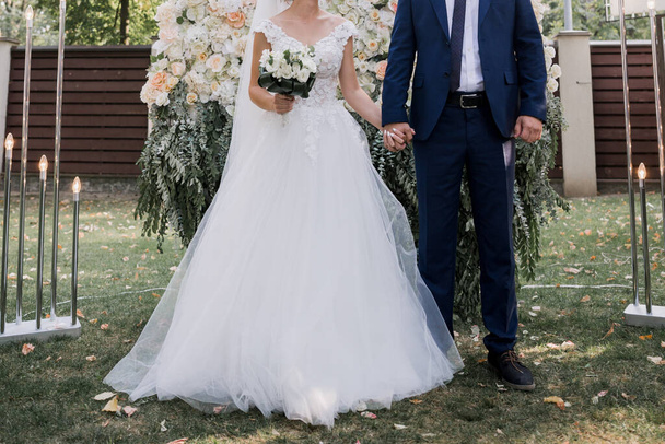 bride and groom at a wedding ceremony - Фото, зображення