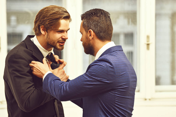 fight, business conflict, confident men or businessmen fight with tie - Zdjęcie, obraz