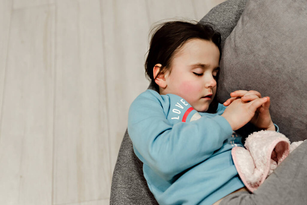 sleeping girl,sleeping little girl covered with a blanket,little girl sleeping in a chair,healthy sleep,beautiful girl covered with a blanket - Photo, Image