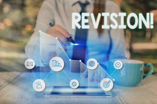 Text sign showing Revision. Conceptual photo action of revising over someone like auditing or accounting. - Photo, Image
