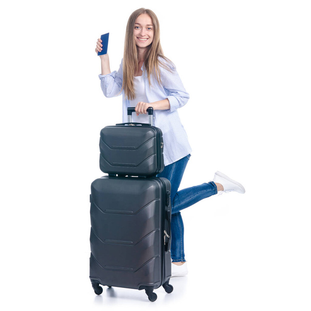 Woman with travel suitcase, passport goes walking smiling happiness - Fotó, kép