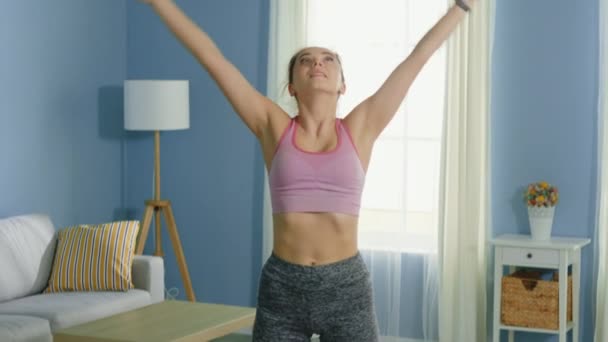 Young Slim Woman Is Doing Breathing Exercise - Materiał filmowy, wideo