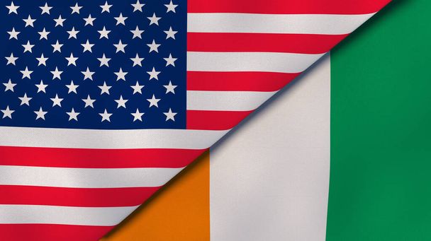 Δύο σημαίες των Ηνωμένων Πολιτειών και της Ακτής Ελεφαντοστού. Επαγγελματικό υπόβαθρο υψηλής ποιότητας. 3D εικονογράφηση - Φωτογραφία, εικόνα