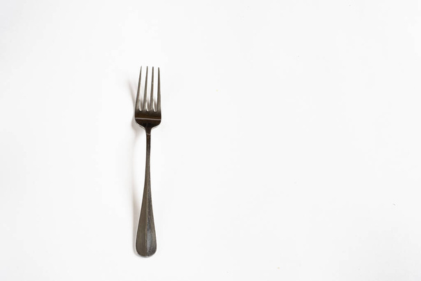 Food fork on a white background - Foto, afbeelding