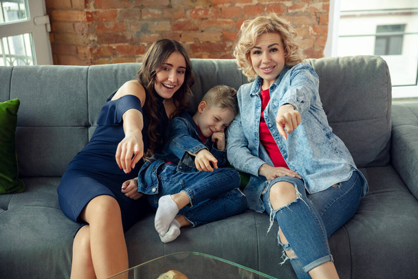 Mother, son and sister at home having fun, comfort and cozy concept, celebrating birthday - Photo, Image