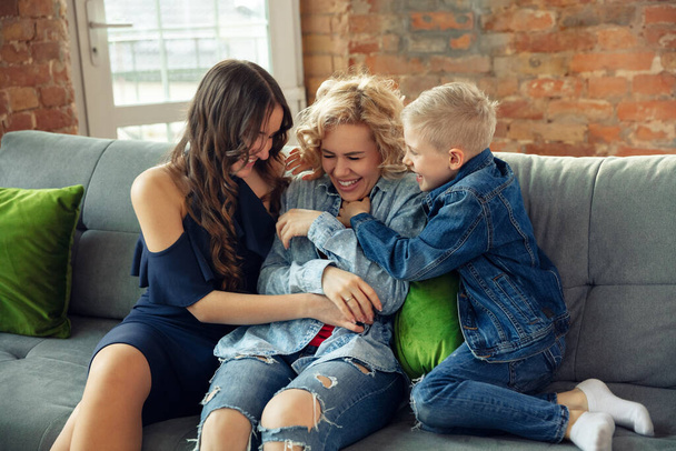 Mother, son and sister at home having fun, comfort and cozy concept, celebrating birthday - Fotoğraf, Görsel