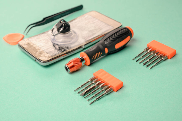 A set of screwdrivers for repairing phones, smartphones, PCs and other office equipment. - Photo, Image